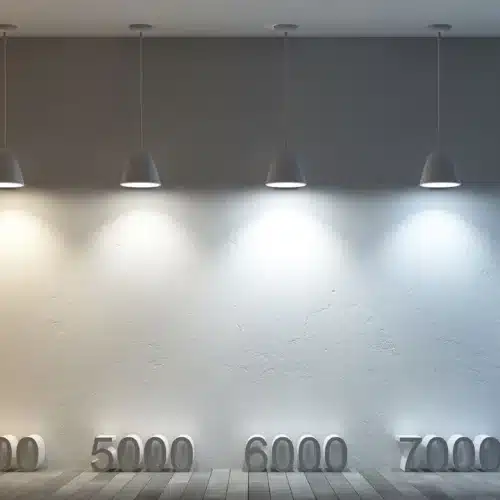 Éclairage mural avec plusieurs spots suspendus, dégradé de couleurs chaudes à froid du jaune à bleu